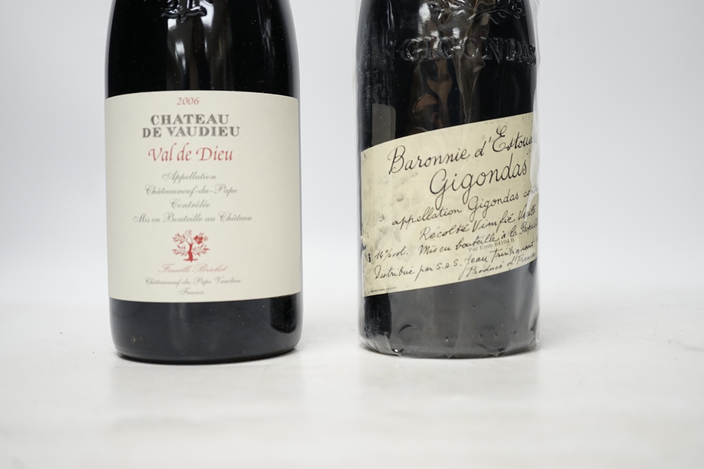 Twelve bottles of wine to include six bottles of Chateau de Vaudieu Val de Dieu 2006, and six bottles of Baronnie d’Estouard Gigondas 2006. Condition - good, storage history unknown.